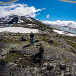 Kristoffer Vandbakk taking a photo of the drone. Styggevatnet in the background.