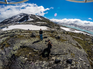 Kristoffer Vandbakk taking a photo of the drone. Styggevatnet in the background.